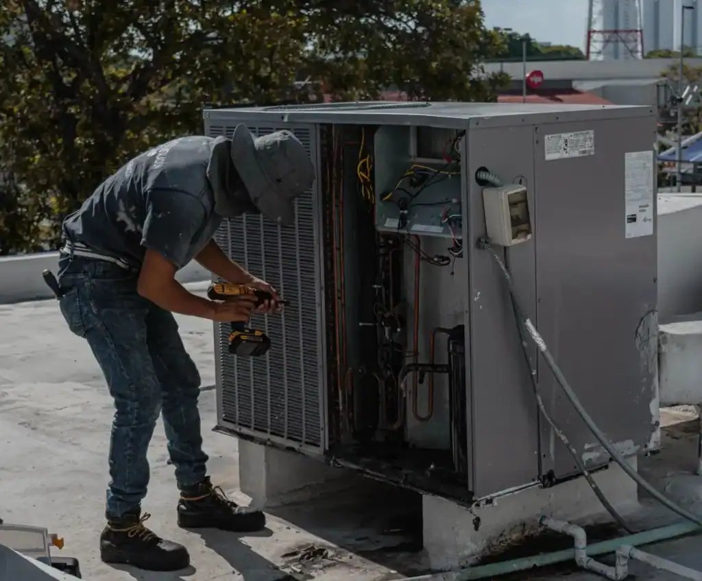 Guardian Services LLC technician reviewing completed AC service with a Rockledge homeowner. ac maintenance near me